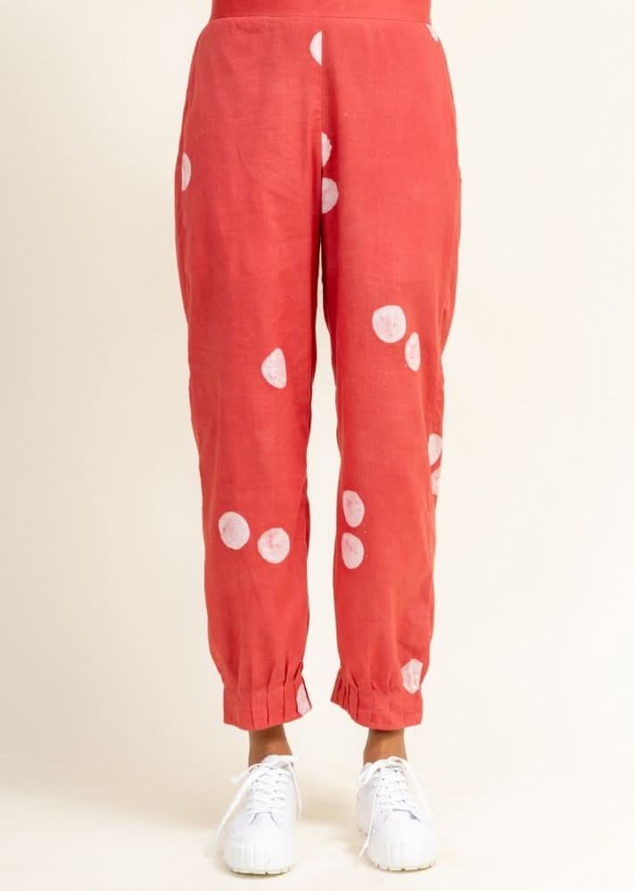 A Model Wearing Peach Upcycled Cotton Coral Tucked Pants, curated by Only Ethikal