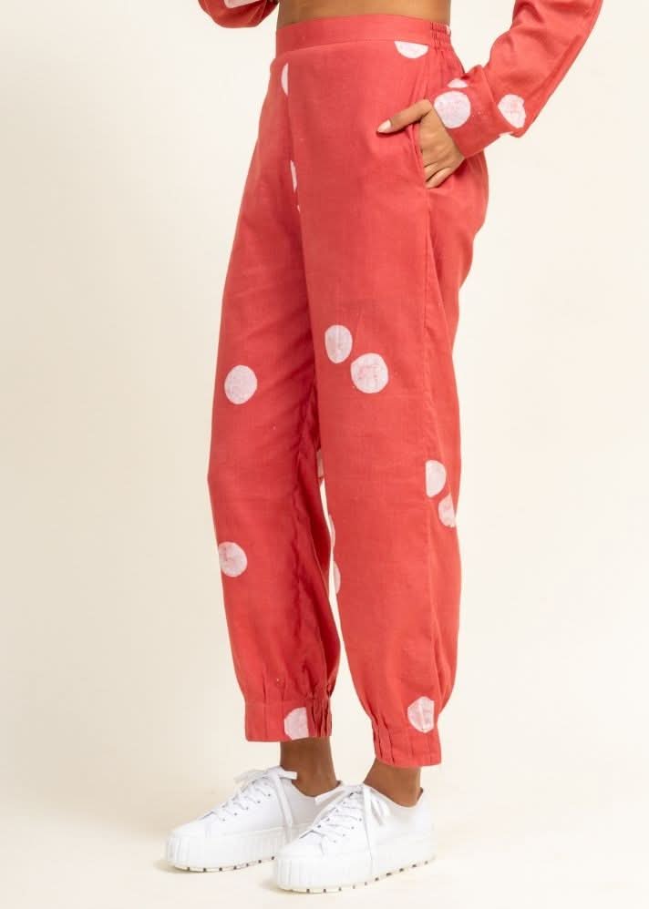 A Model Wearing Peach Upcycled Cotton Coral Tucked Pants, curated by Only Ethikal