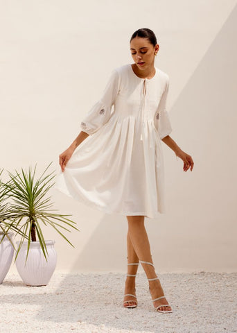 A Model Wearing White Hemp White Mid Summer Dress, curated by Only Ethikal