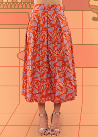 A Model Wearing Red Cotton Wanda Pleated Skirt, curated by Only Ethikal