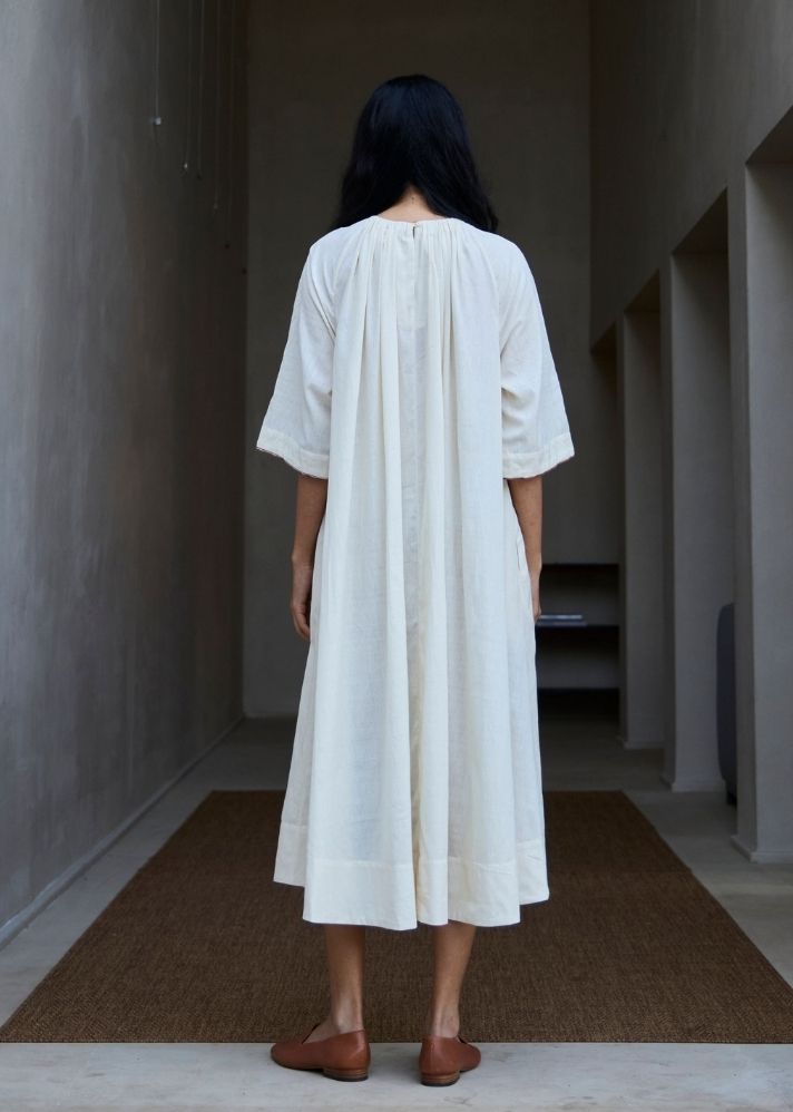 A Model Wearing White Handwoven Cotton Bulan Handwoven Striped Midi Dress , curated by Only Ethikal