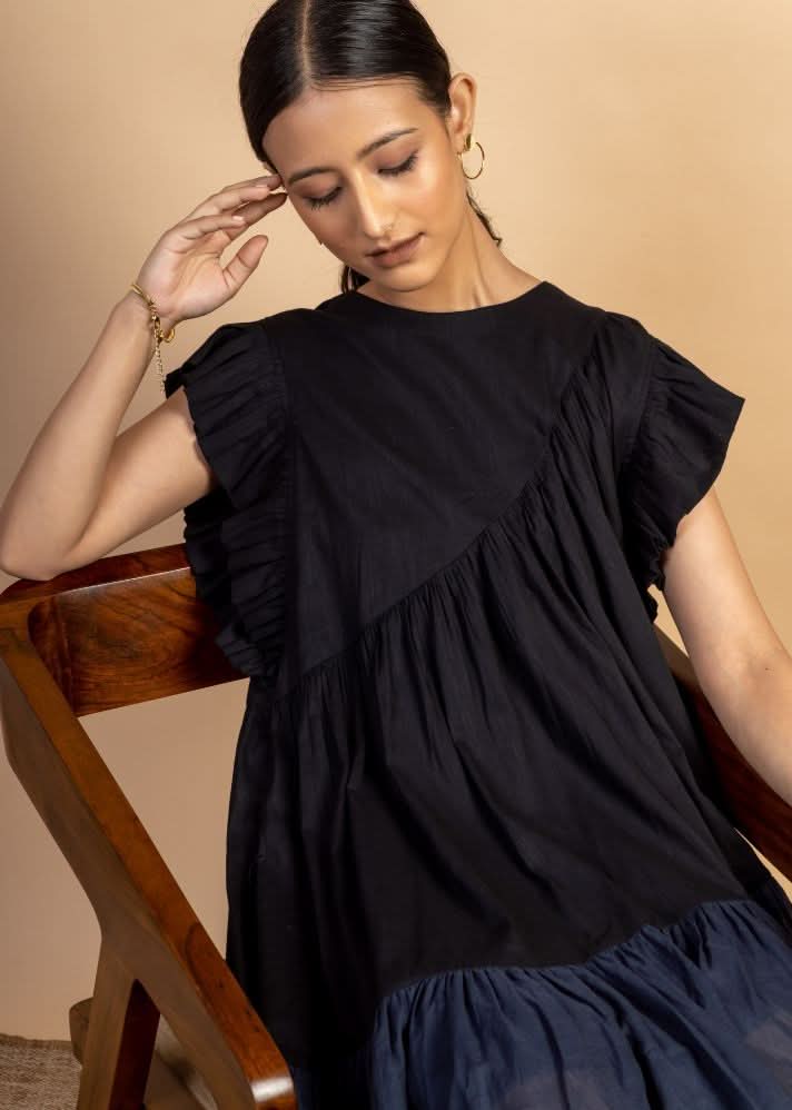 A Model Wearing Black Upcycled Cotton Laurie Dress, curated by Only Ethikal