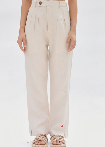 A Model Wearing Off White Linen Ocean Breeze Linen Trousers, curated by Only Ethikal