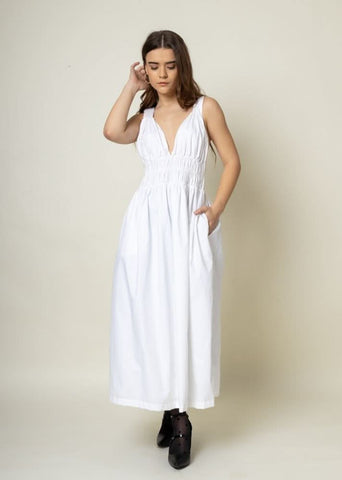 A Model Wearing White Organic Cotton August White Dress, curated by Only Ethikal