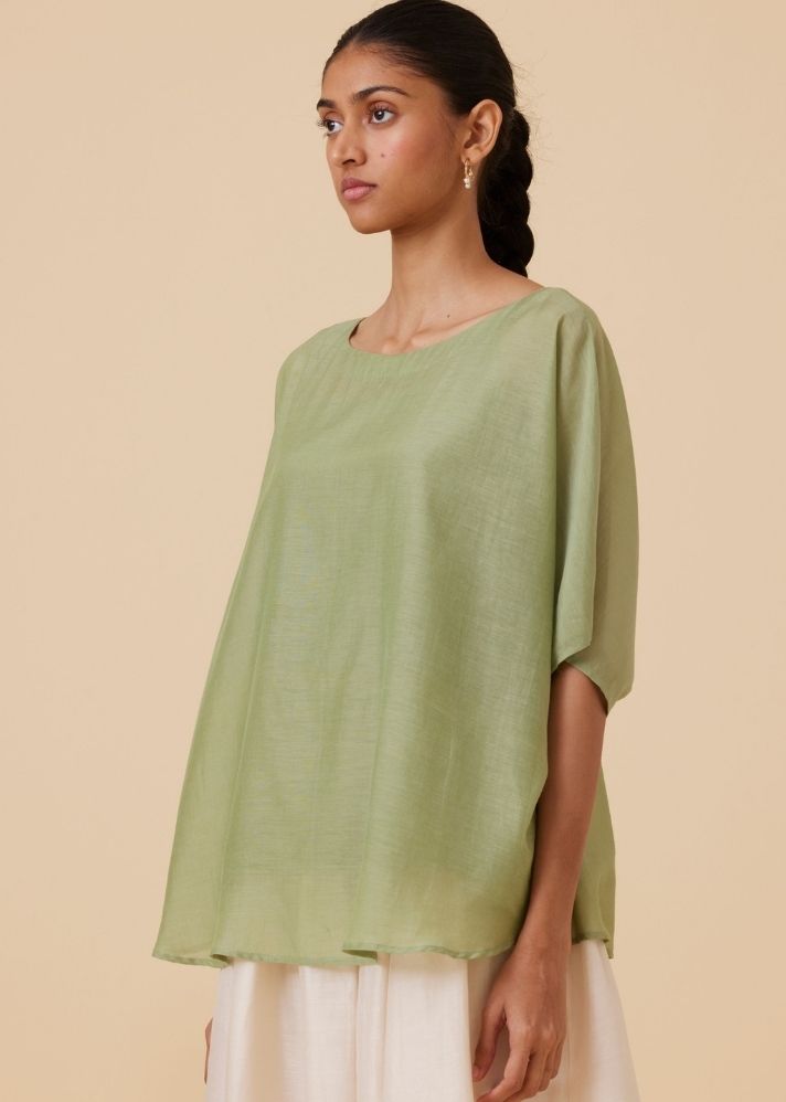 A Model Wearing Green Cotton silk Kosh Green Cape Top , curated by Only Ethikal