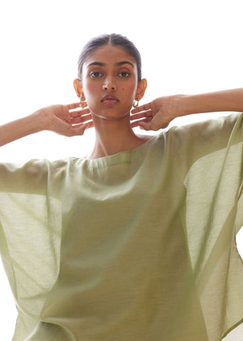 A Model Wearing Green Cotton silk Kosh Green Cape Top , curated by Only Ethikal