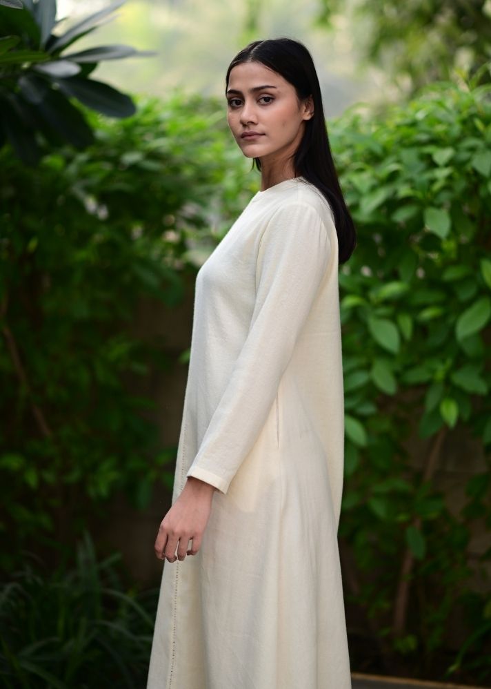 A Model Wearing White Wool White Starflowerdress , curated by Only Ethikal