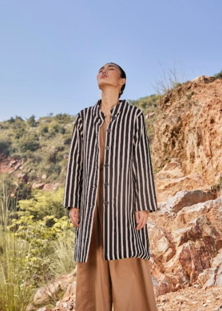 A Model Wearing Black Warm sandwich fabric Illusion Reversable Jacket curated by Only Ethikal