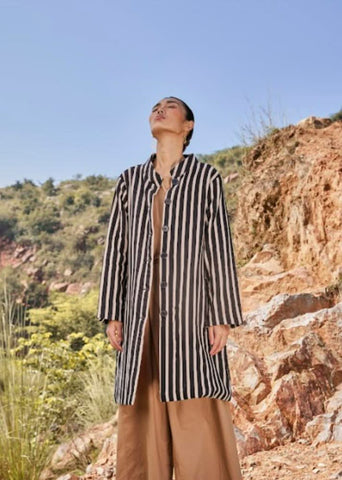 A Model Wearing Black Warm sandwich fabric Illusion Reversable Jacket curated by Only Ethikal