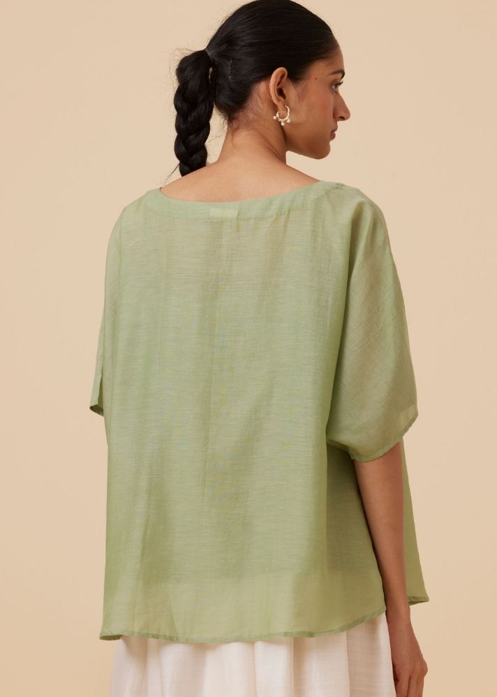 A Model Wearing Green Cotton silk Kosh Green Cape Top , curated by Only Ethikal