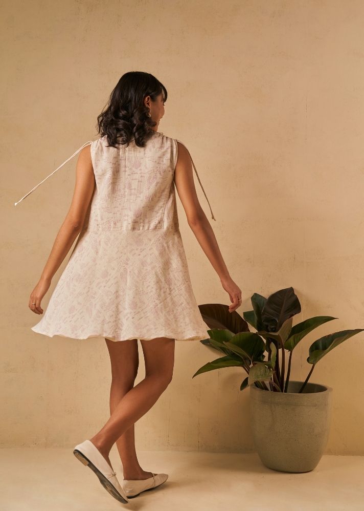 A Model Wearing White Organic Cotton The Coral Tide handwoven dress, curated by Only Ethikal
