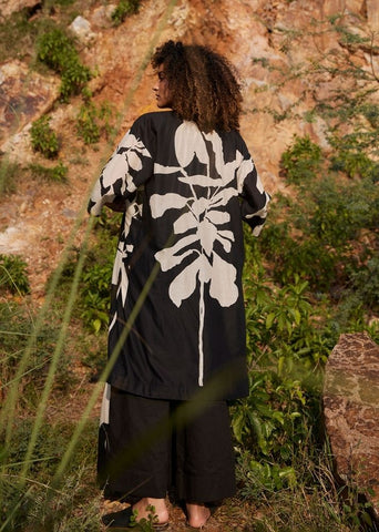 A Model Wearing Black Pure Cotton Wishful Urge Overlay curated by Only Ethikal