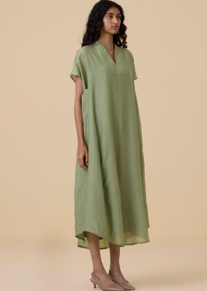 A Model Wearing Green Cotton silk Meer Green Kaftan , curated by Only Ethikal