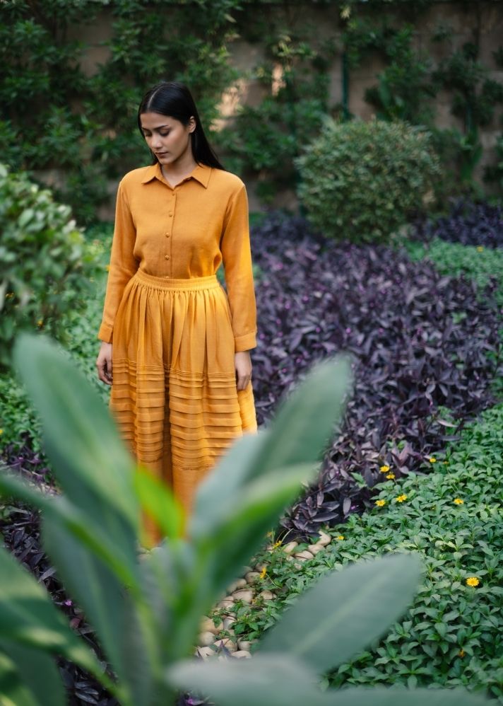 A Model Wearing Yellow Wool Mustard Misha Skirt Set, curated by Only Ethikal