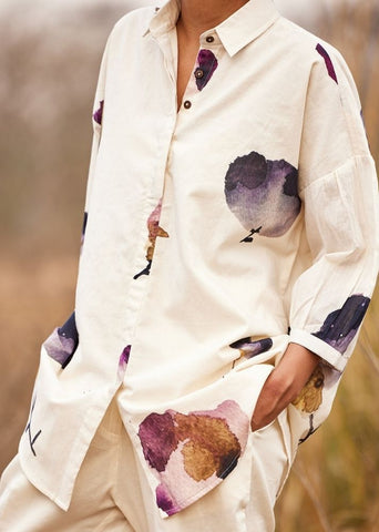 A Model Wearing White Cotton Mul Cascade fling Pants,curated by Only Ethikal