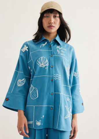 A Model Wearing Blue Cotton Twill Meet Me By The Sea Handwoven Twill Shirt, curated by Only Ethikal