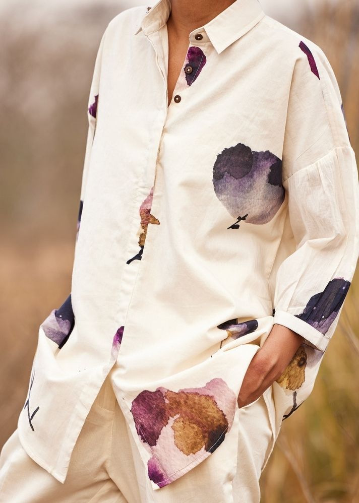 A Model Wearing White Cotton Mul Cascade fling Shirt,curated by Only Ethikal