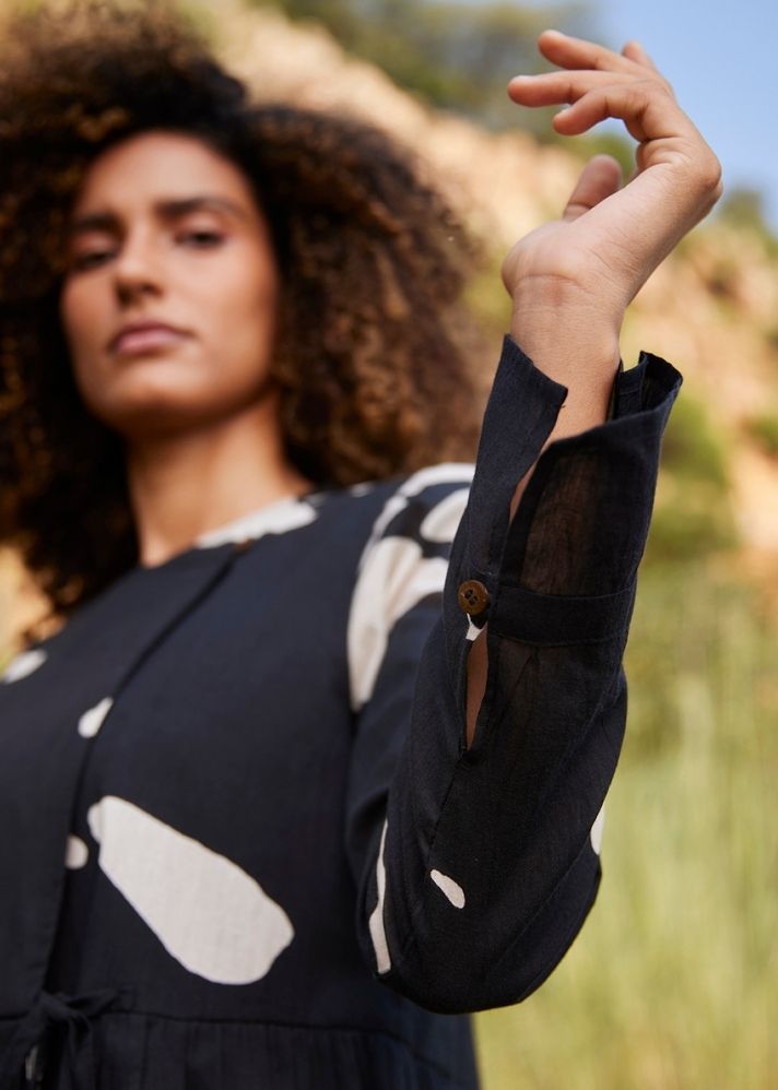 A Model Wearing Black Pure Cotton Droplet Blouse curated by Only Ethikal