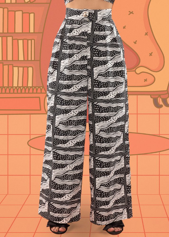 A Model Wearing White Cotton Marty Trousers, curated by Only Ethikal