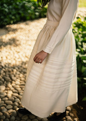 A Model Wearing White Wool White Misha Skirt Set, curated by Only Ethikal