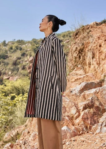 A Model Wearing Black Warm sandwich fabric Illusion Reversable Jacket curated by Only Ethikal