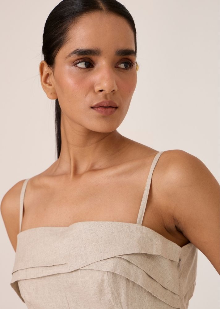 A Model Wearing Beige Linen Azzah Beige Strappy Midi Dress , curated by Only Ethikal