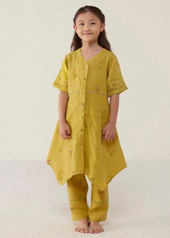 A Model Wearing Yellow Linen Kids Inoya Linen Co-Ord Set- Ochre, curated by Only Ethikal