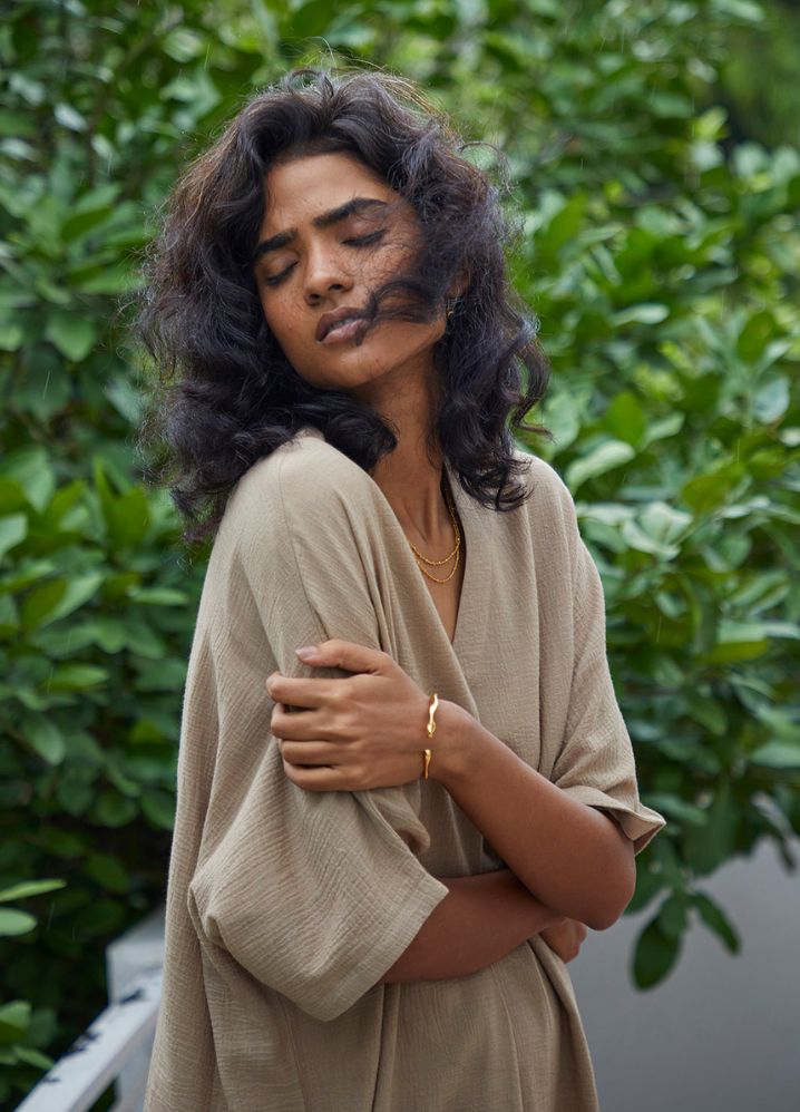 A Model Wearing Beige Pure Cotton Hazel Kaftan curated by Only Ethikal