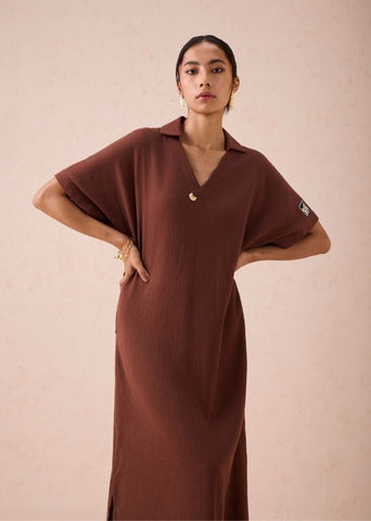 A Model Wearing Brown Organic Cotton The Mountainside Organic Cotton Collar Maxi Dress, curated by Only Ethikal