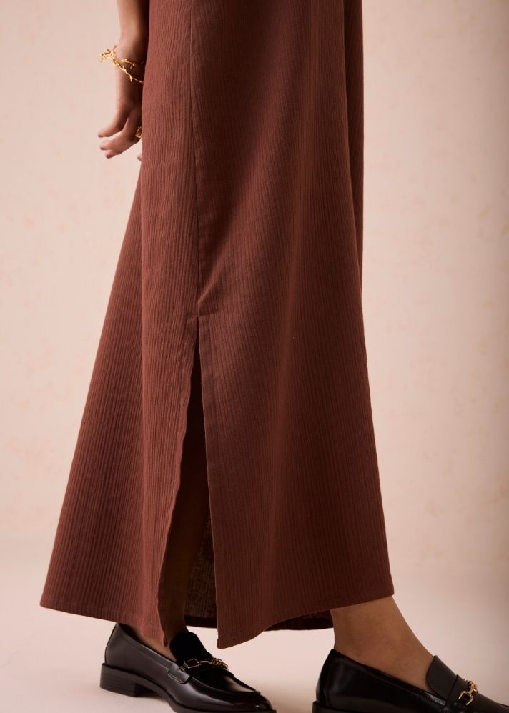 A Model Wearing Brown Organic Cotton The Mountainside Organic Cotton Collar Maxi Dress, curated by Only Ethikal