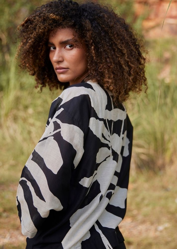 A Model Wearing Black Pure Cotton Dazed Trance Top curated by Only Ethikal