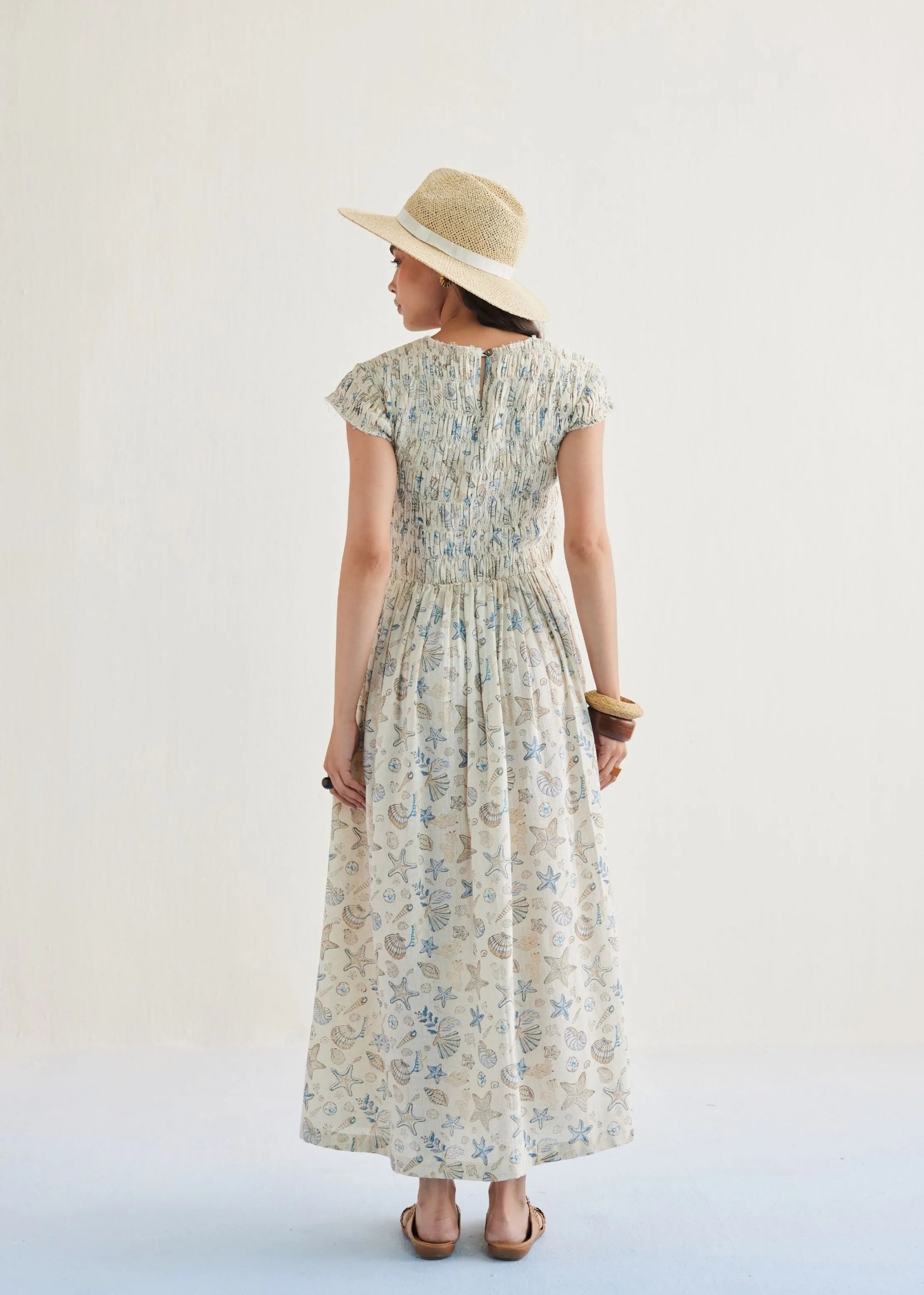 A Model Wearing Off White Handwoven Cotton Pearly Ocean Cotton Off-White Maxi Dress, curated by Only Ethikal