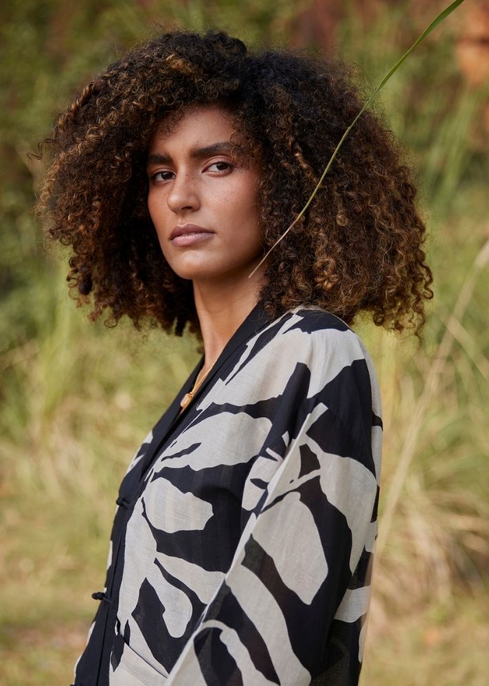 A Model Wearing Black Pure Cotton Dazed Trance Top curated by Only Ethikal