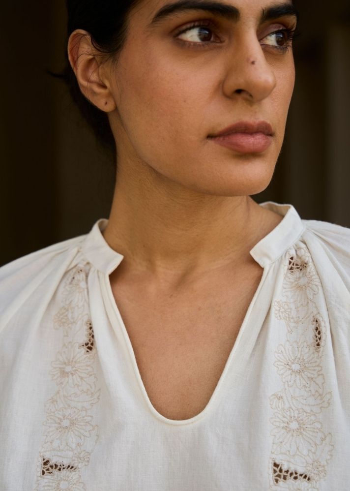 A Model Wearing White Handwoven Cotton Bheer Handwoven Embroidered Top , curated by Only Ethikal