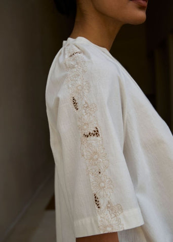 A Model Wearing White Handwoven Cotton Bheer Handwoven Embroidered Top , curated by Only Ethikal