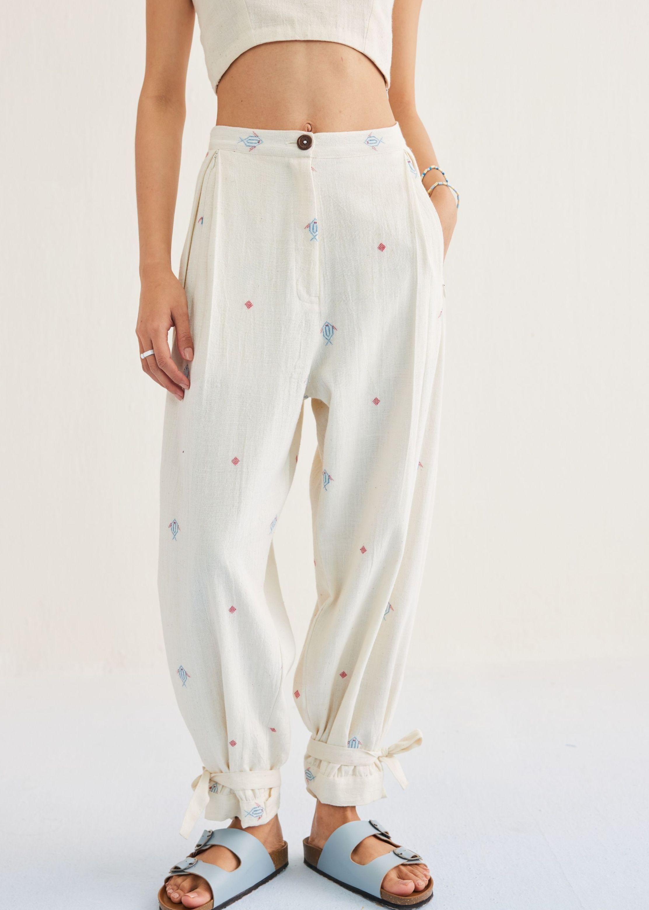 A Model Wearing Off White Handwoven Cotton Swim Free Handwoven Kala Cotton Trousers, curated by Only Ethikal