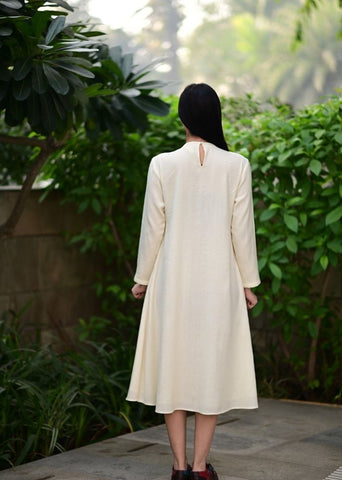 A Model Wearing White Wool White Starflowerdress , curated by Only Ethikal