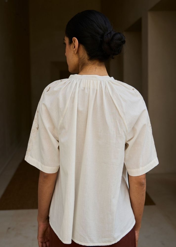 A Model Wearing White Handwoven Cotton Bheer Handwoven Embroidered Top , curated by Only Ethikal