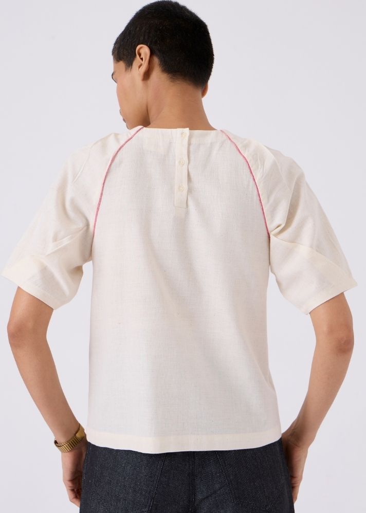 A Model Wearing Beige Handwoven Cotton Loto Ivory Khadi Top With Statement Sleeve L, curated by Only Ethikal