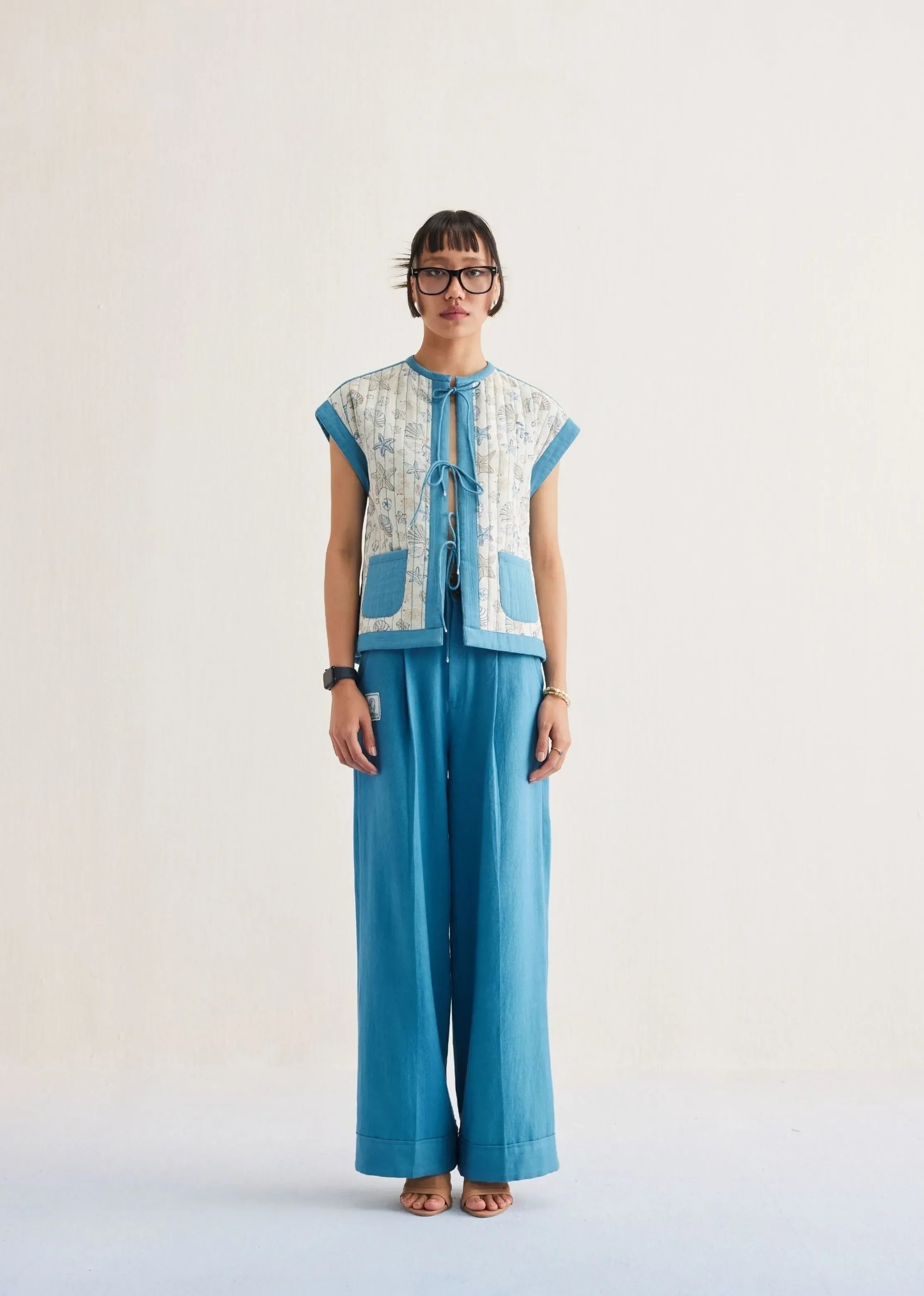 A Model Wearing Blue Handwoven Cotton The Tidal Cotton Blue Reversible Vest , curated by Only Ethikal