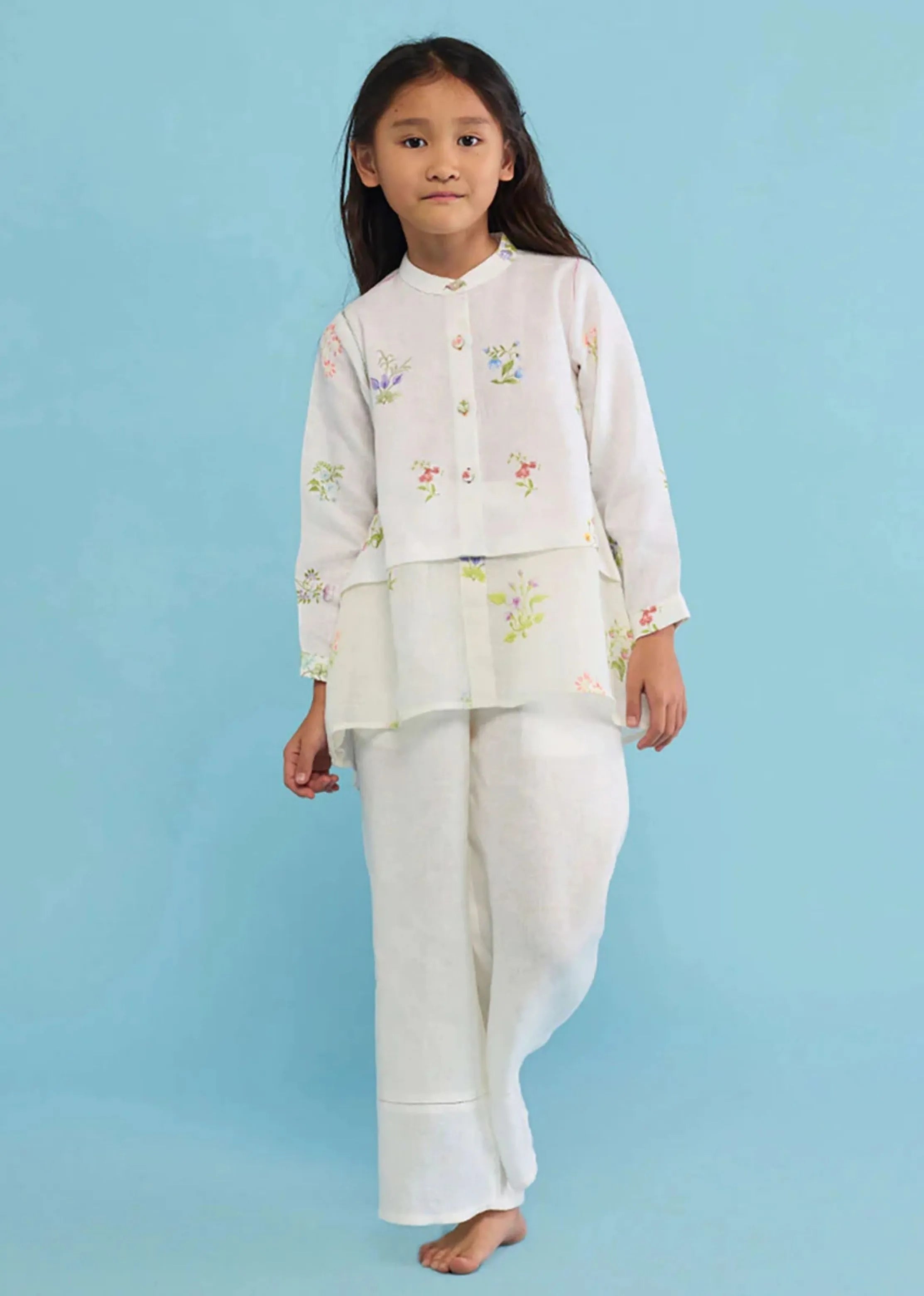 A Model Wearing White Linen Kids Leina A- Line Linen Co-Ord Set- White, curated by Only Ethikal