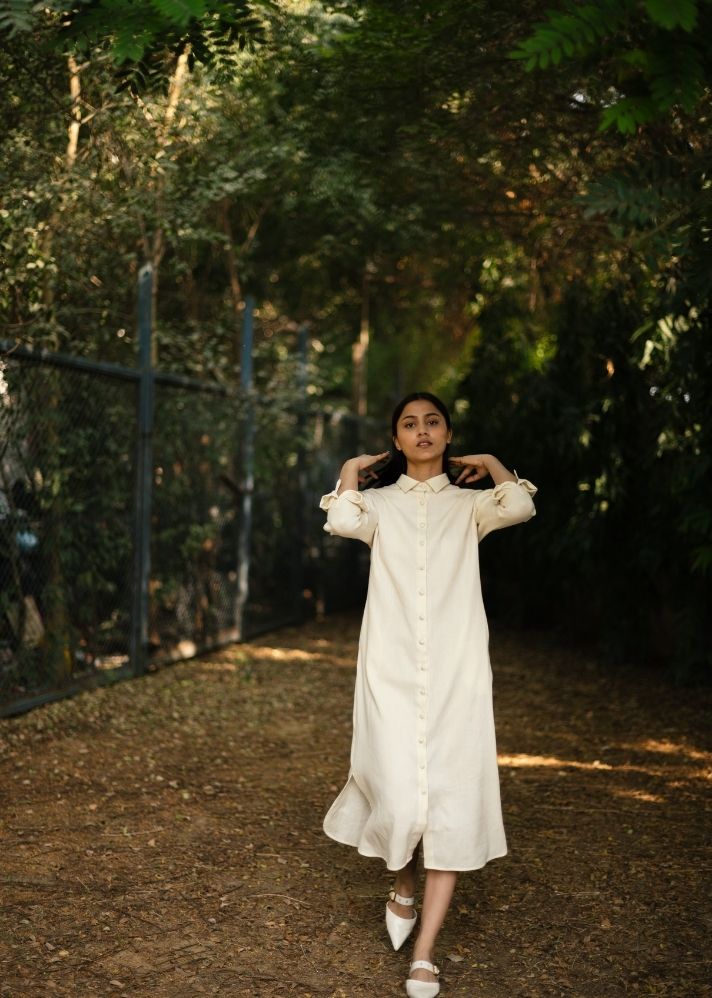 A Model Wearing White Wool White Zinniadress , curated by Only Ethikal