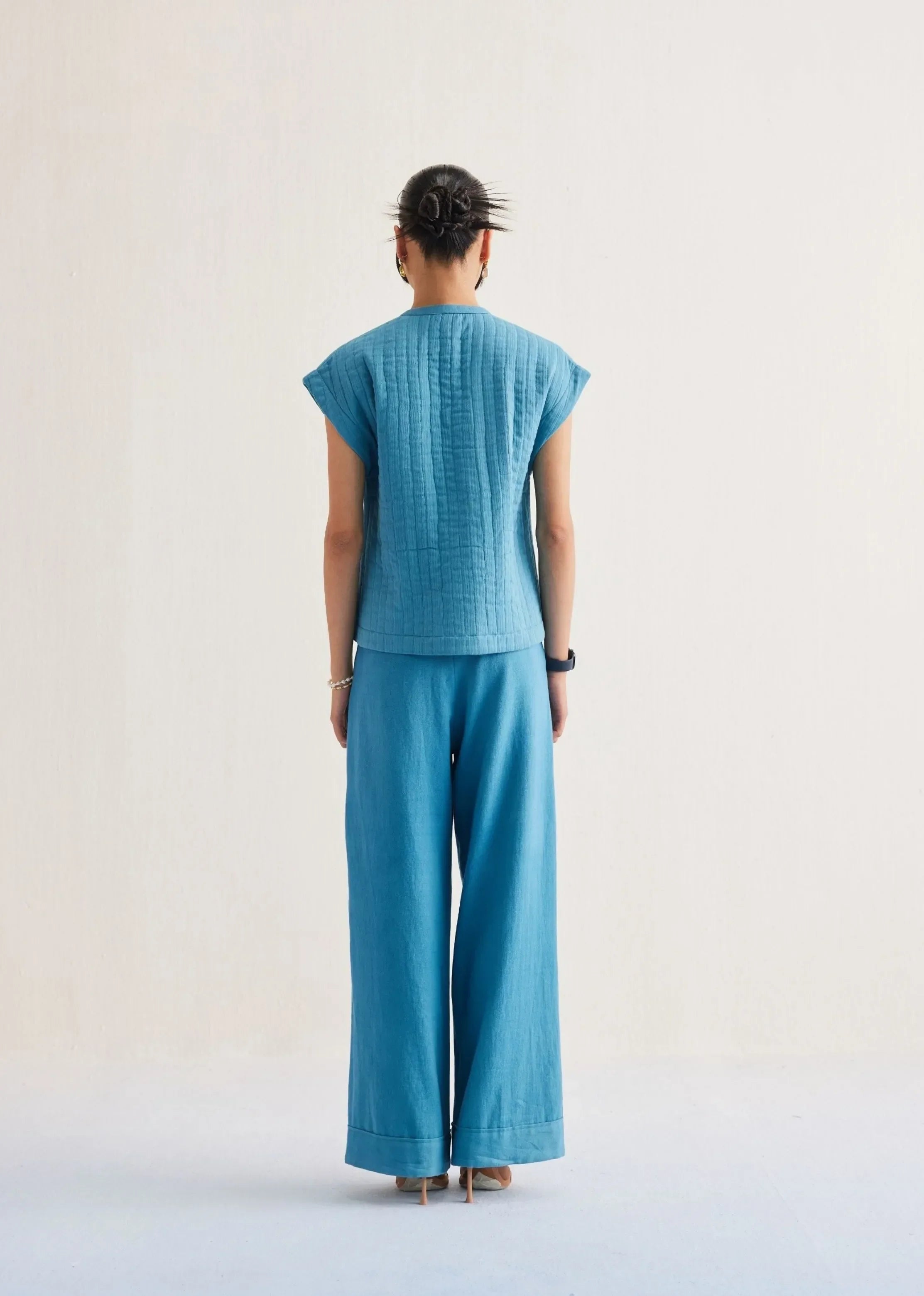 A Model Wearing Blue Handwoven Cotton The Tidal Cotton Blue Reversible Vest , curated by Only Ethikal