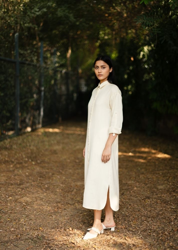 A Model Wearing White Wool White Zinniadress , curated by Only Ethikal