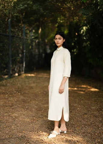 A Model Wearing White Wool White Zinniadress , curated by Only Ethikal