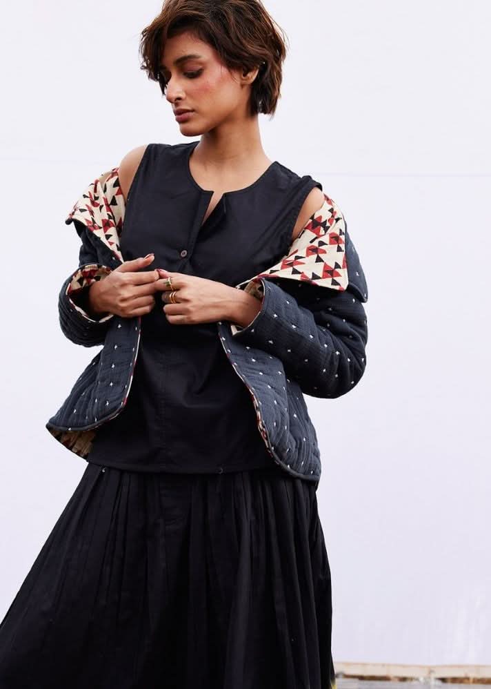A Model Wearing Black Pure Cotton Coal Jacket curated by Only Ethikal