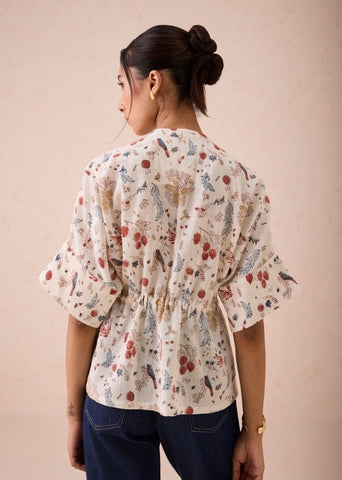 A Model Wearing White Handwoven Cotton Rustic Beginnings Handspun Handwoven Organic Cotton Peplum Top, curated by Only Ethikal