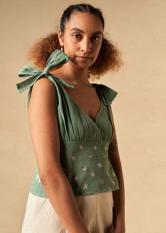 A Model Wearing Green Organic Cotton The Ocean Tide kala cotton top, curated by Only Ethikal