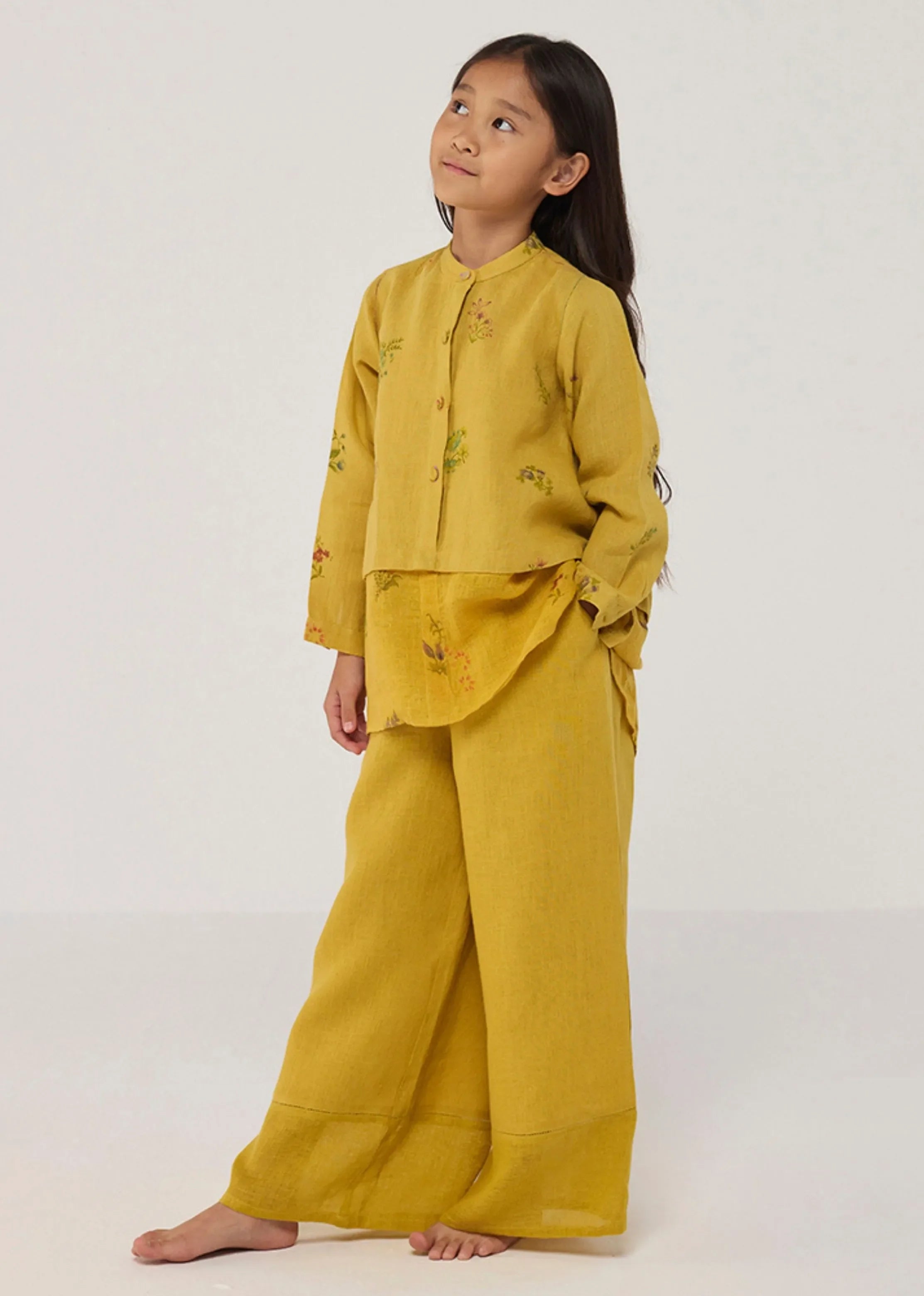 A Model Wearing Yellow Linen Kids Leina A- Line Linen Co-Ord Set- Ochre, curated by Only Ethikal