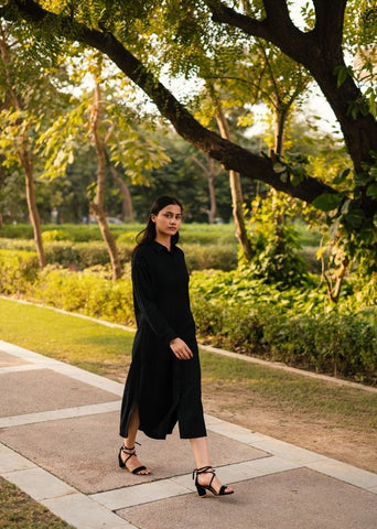 A Model Wearing Black Wool Black Zinniadress , curated by Only Ethikal